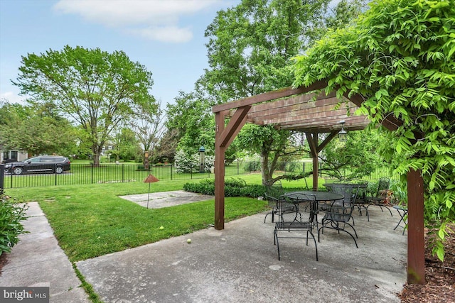 view of patio featuring a pergola and fence