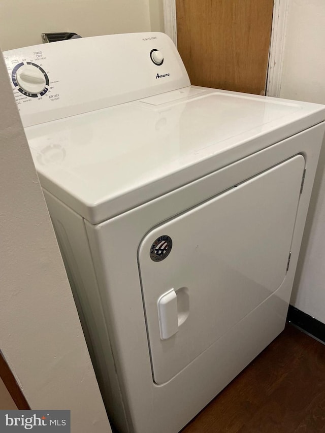 216 Highland Blvd Unit 77, New Castle, DE 19720 - washroom with washer / clothes dryer and dark wood-style floors