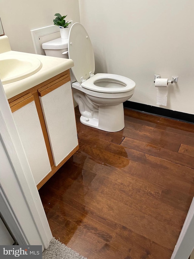 216 Highland Blvd Unit 77, New Castle, DE 19720 - half bath with toilet, vanity, and wood finished floors