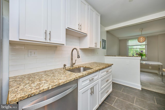 2030 N Adams St N Unit 507, Arlington, VA 22201 - kitchen with dishwasher, a sink, white cabinets, and decorative backsplash