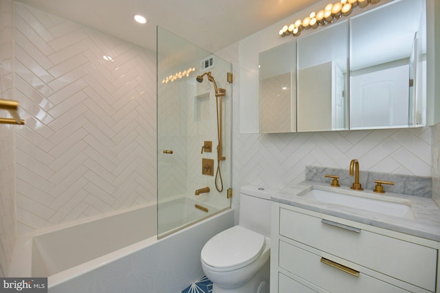 2030 N Adams St N Unit 507, Arlington, VA 22201 - bathroom with toilet, vanity, shower / bath combination, and decorative backsplash