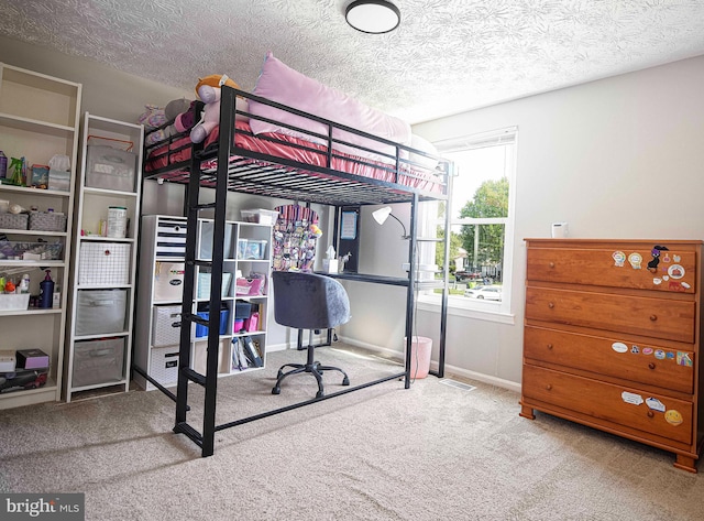 702 Rainbow Ct, Edgewood, MD 21040 - carpeted bedroom with baseboards, a textured ceiling, and visible vents