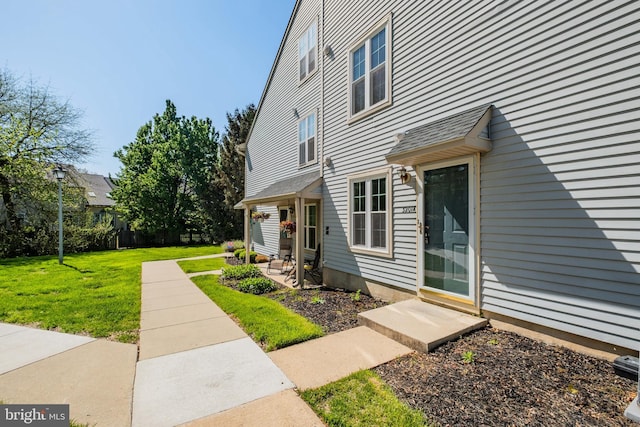 exterior space featuring a patio and a yard