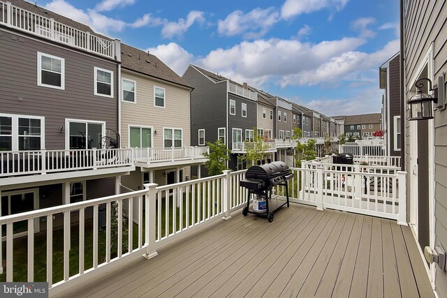 1701 Beech Leaf St, Dumfries, VA 22026 - wooden terrace featuring a residential view and a grill