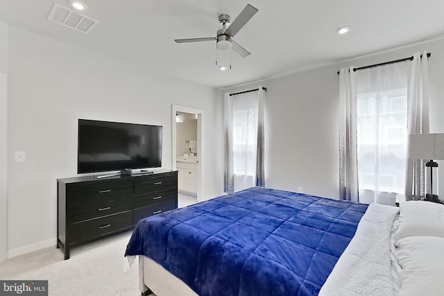 1701 Beech Leaf St, Dumfries, VA 22026 - bedroom with multiple windows, light colored carpet, recessed lighting, a ceiling fan, and connected bathroom