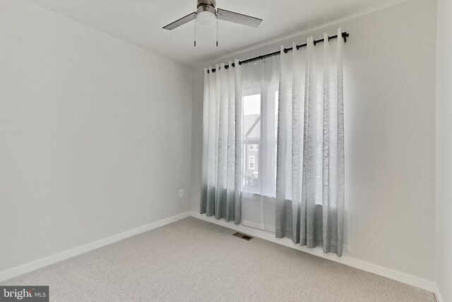 1701 Beech Leaf St, Dumfries, VA 22026 - carpeted spare room with a ceiling fan and baseboards