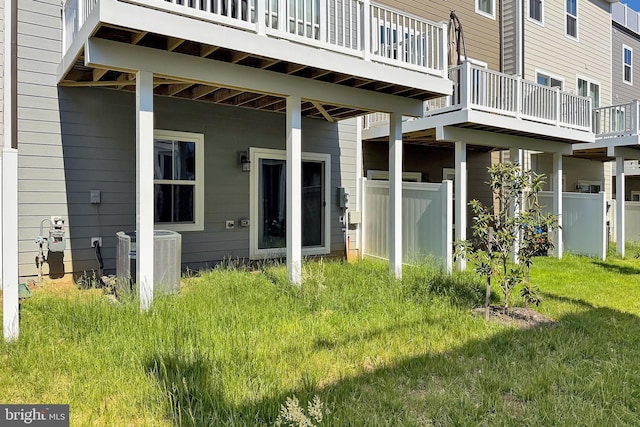 1701 Beech Leaf St, Dumfries, VA 22026 - rear view of property with central AC unit