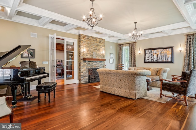 33 Rosedale Rd, Princeton, NJ 08540 - living room featuring an inviting chandelier, wood finished floors, coffered ceiling, beam ceiling, and visible vents