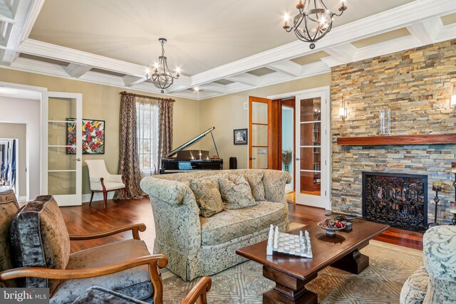 33 Rosedale Rd, Princeton, NJ 08540 - living room featuring beam ceiling, wood finished floors, ornamental molding, coffered ceiling, and a notable chandelier