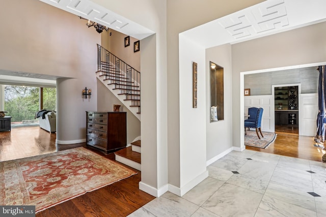 33 Rosedale Rd, Princeton, NJ 08540 - foyer with baseboards, stairway, a high ceiling, and wood finished floors