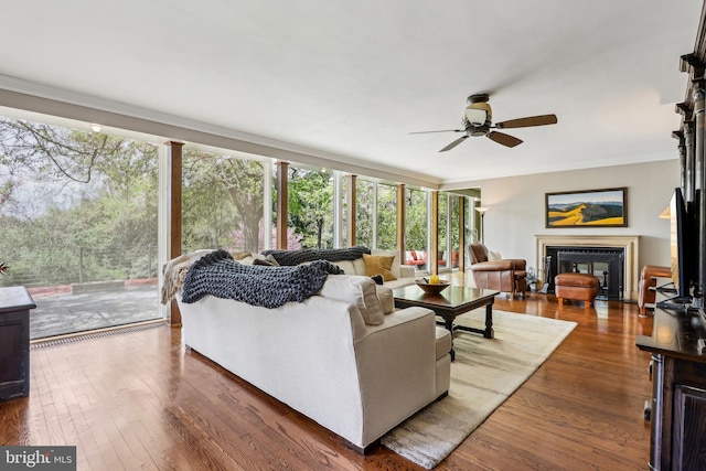 33 Rosedale Rd, Princeton, NJ 08540 - living area with a ceiling fan, a wealth of natural light, a glass covered fireplace, and crown molding