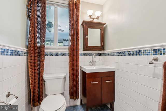 33 Rosedale Rd, Princeton, NJ 08540 - bathroom featuring tile walls, toilet, wainscoting, and vanity