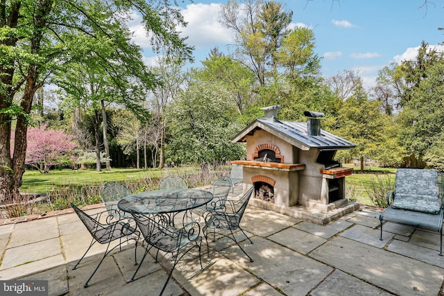 33 Rosedale Rd, Princeton, NJ 08540 - view of patio with an outdoor fireplace and outdoor dining space
