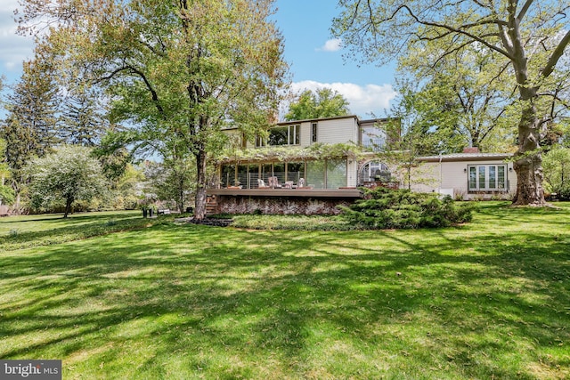 33 Rosedale Rd, Princeton, NJ 08540 - exterior space featuring a lawn, a chimney, and a wooden deck