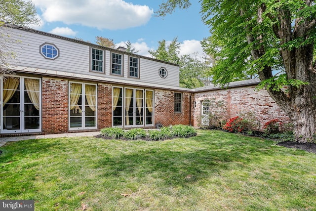 33 Rosedale Rd, Princeton, NJ 08540 - rear view of house featuring a yard and brick siding
