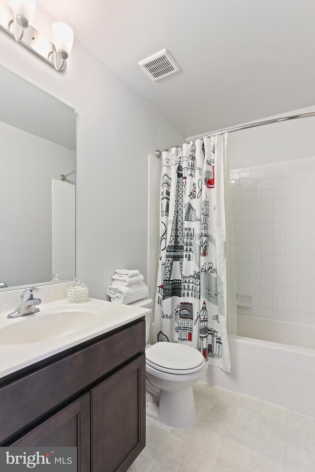 209 Sheridan St, Taneytown, MD 21787 - bathroom with toilet, shower / tub combo, vanity, and tile patterned flooring
