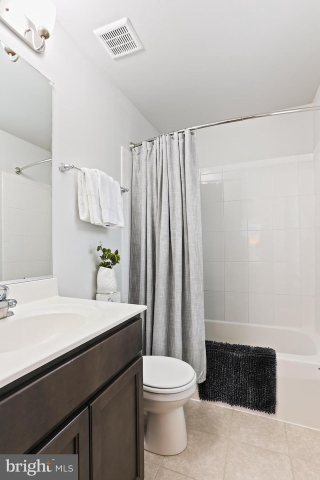 209 Sheridan St, Taneytown, MD 21787 - full bathroom with tile patterned flooring, shower / bath combo, toilet, and vanity