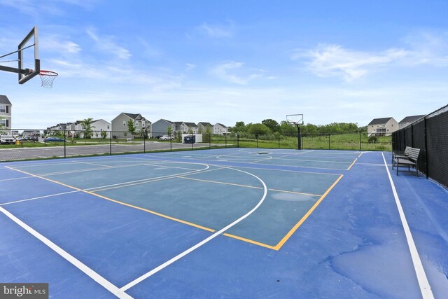 209 Sheridan St, Taneytown, MD 21787 - view of basketball court featuring community basketball court, fence, and a residential view