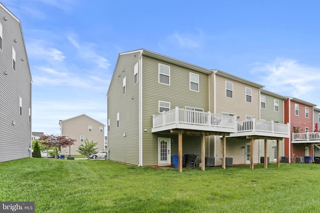 209 Sheridan St, Taneytown, MD 21787 - rear view of house featuring a lawn, a wooden deck, and cooling unit