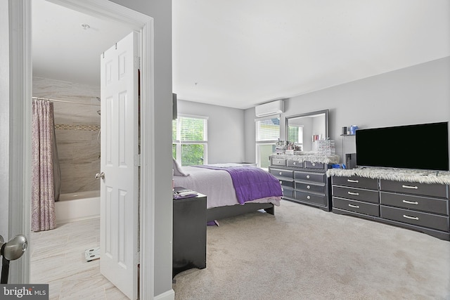 bedroom with a wall mounted air conditioner