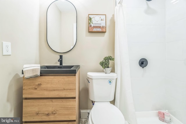 226 N 64th St, Philadelphia, PA 19139 - bathroom with a tile shower and toilet