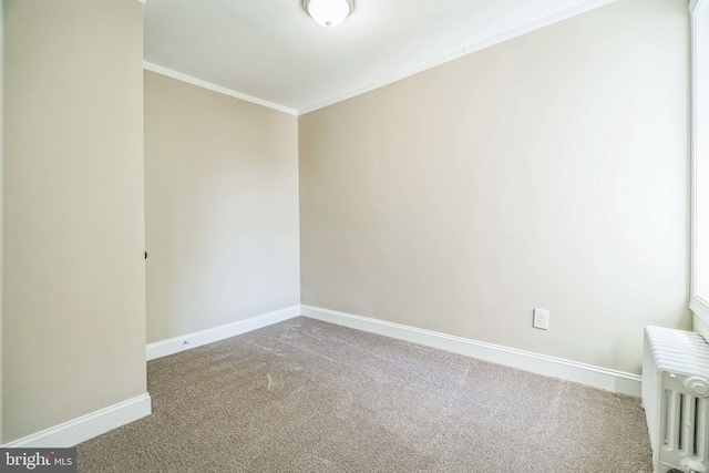 226 N 64th St, Philadelphia, PA 19139 - carpeted spare room with crown molding, baseboards, and radiator