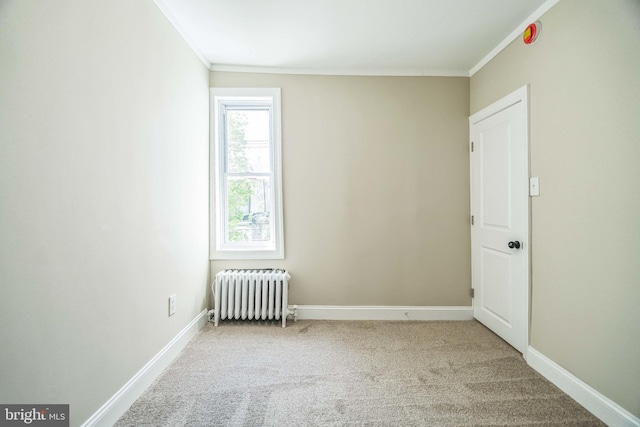226 N 64th St, Philadelphia, PA 19139 - empty room featuring crown molding, carpet, and radiator