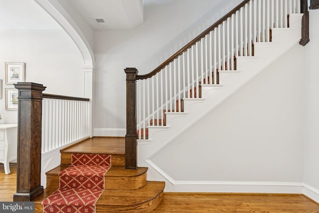 1847 Lamont St NW, Washington, DC 20010 - stairs featuring wood finished floors and baseboards