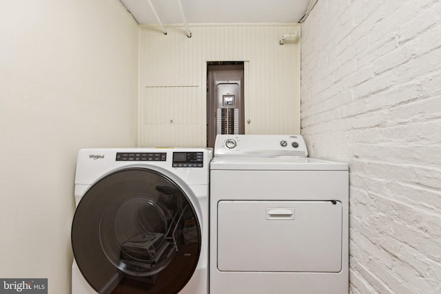 1847 Lamont St NW, Washington, DC 20010 - washroom featuring separate washer and dryer and electric panel
