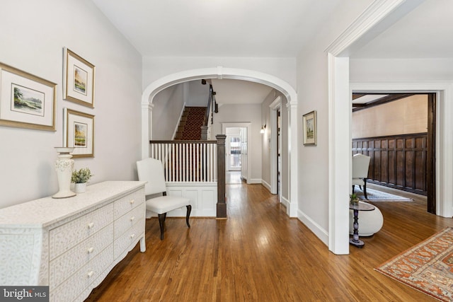 1847 Lamont St NW, Washington, DC 20010 - hallway with wood finished floors, arched walkways, and stairway