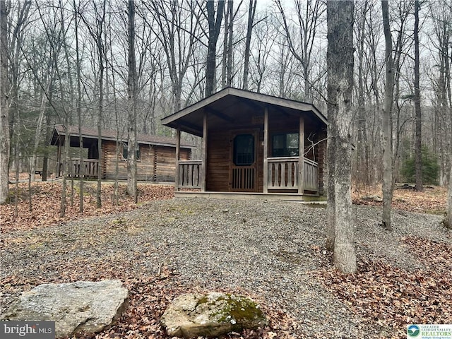 view of outdoor structure featuring a porch