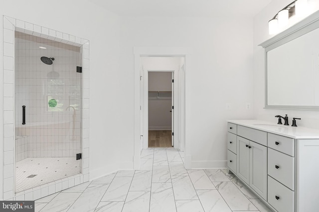 4763 Williamsburg Blvd, Arlington, VA 22207 - full bath with a shower stall, marble look tiles, baseboards, vanity, and a spacious closet