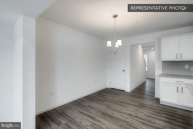 325 Magnolia Ln Lot 103, State College, PA 16803 - unfurnished dining area with baseboards, dark wood finished floors, and a chandelier