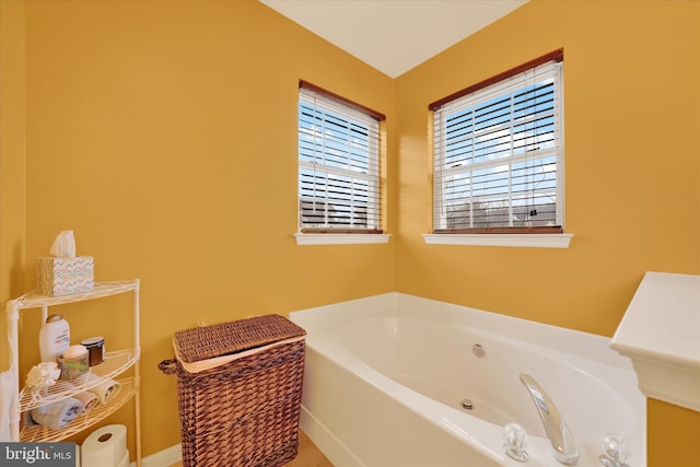 full bathroom with a garden tub