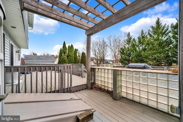 wooden terrace featuring a pergola