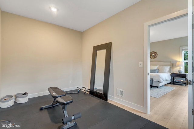 40928 Arcadian Pond Ct, Aldie, VA 20105 - workout room with baseboards and light wood-type flooring