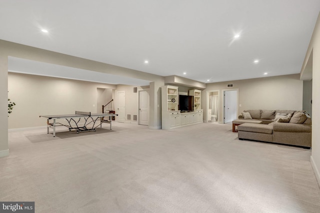 40928 Arcadian Pond Ct, Aldie, VA 20105 - carpeted living room featuring stairway, baseboards, and recessed lighting