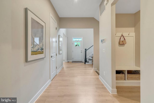 40928 Arcadian Pond Ct, Aldie, VA 20105 - hall featuring light wood finished floors, stairway, and baseboards