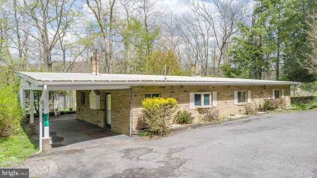 1321 Marsh Hill Rd, Mc Henry, MD 21541 - single story home with metal roof, a chimney, an attached carport, and asphalt driveway