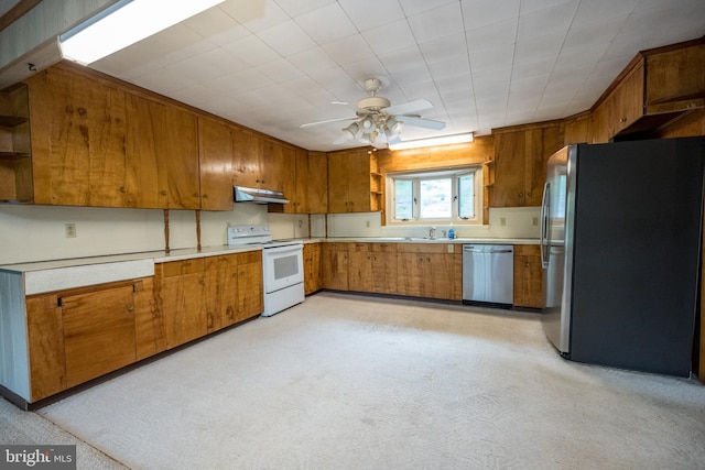 1321 Marsh Hill Rd, Mc Henry, MD 21541 - kitchen with stainless steel appliances, under cabinet range hood, brown cabinets, open shelves, and light countertops