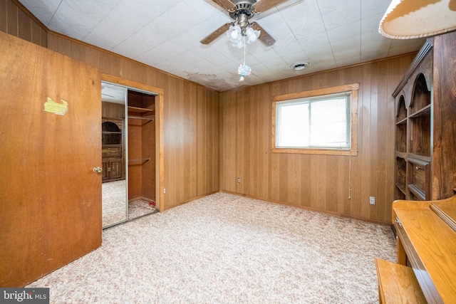 1321 Marsh Hill Rd, Mc Henry, MD 21541 - unfurnished bedroom with carpet, wood walls, a closet, and ceiling fan
