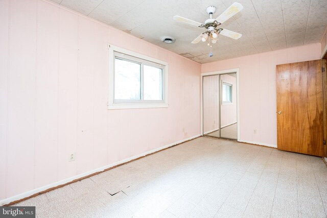 1321 Marsh Hill Rd, Mc Henry, MD 21541 - unfurnished bedroom featuring multiple windows, ceiling fan, and a closet