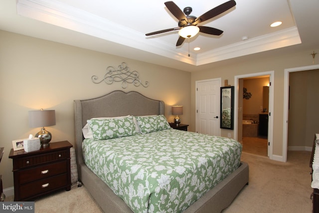 bedroom with crown molding, recessed lighting, light carpet, and a raised ceiling