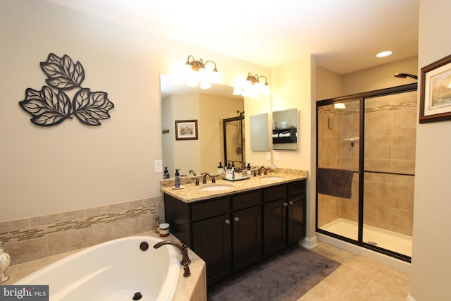 full bathroom featuring a bath, a shower stall, a sink, and tile patterned flooring