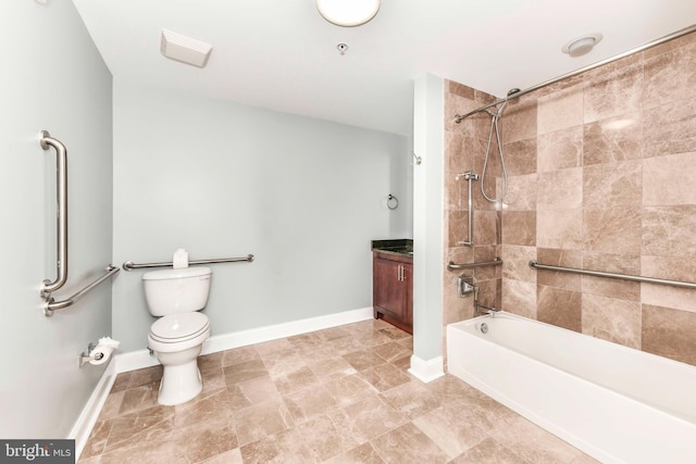 bathroom with baseboards, vanity, toilet, and  shower combination