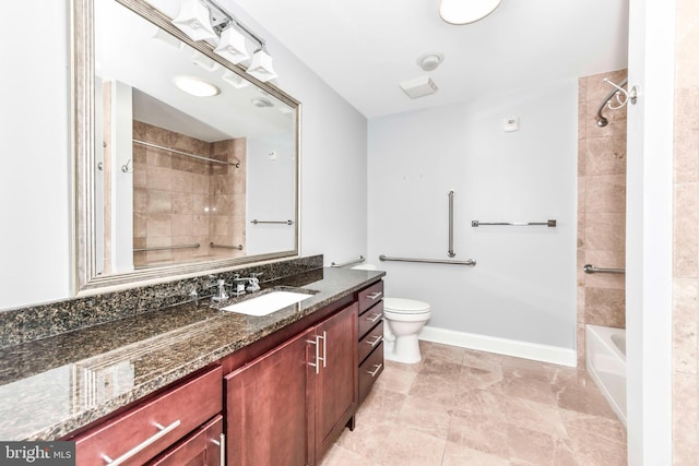 full bath with vanity, baseboards, tub / shower combination, and toilet