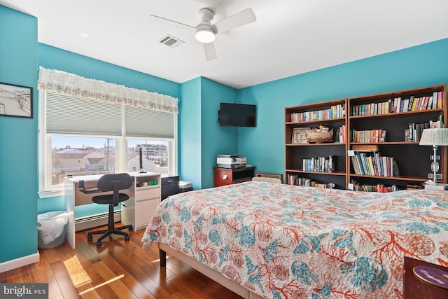 1511 Barnegat Ave, Ship Bottom, NJ 08008 - bedroom featuring ceiling fan, baseboards, wood finished floors, a baseboard radiator, and visible vents