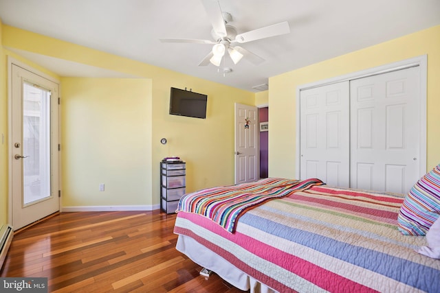 1511 Barnegat Ave, Ship Bottom, NJ 08008 - bedroom featuring a closet, hardwood / wood-style floors, baseboards, ceiling fan, and a baseboard heating unit