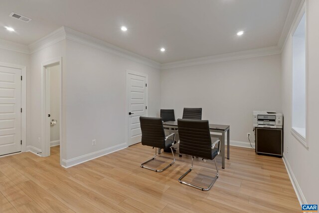 office area with visible vents, crown molding, light wood-type flooring, baseboards, and recessed lighting