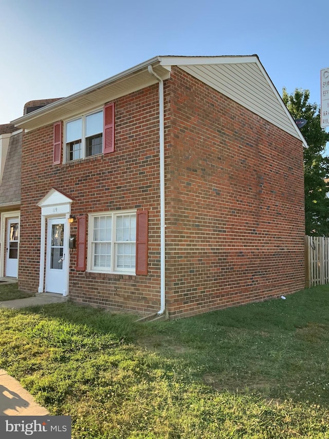 119 Hickok Cir, Fredericksburg, VA 22401 - view of home's exterior featuring a lawn and brick siding